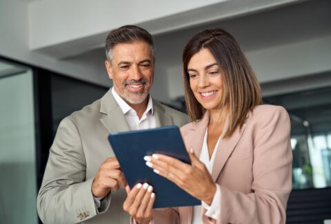 smiling,busy,middle,aged,business,man,and,business,woman,professional